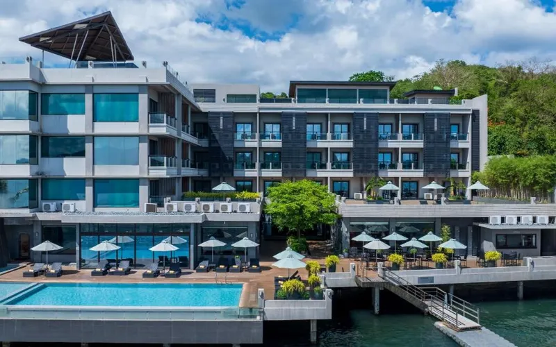 Two Seasons Coron Bayside Hotel with its pool deck and jetty over the water